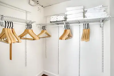 a walk in closet with wooden utensils and towels at Hollywood 1BR w Pool WD Gym nr Metro LAX-867 in Los Angeles
