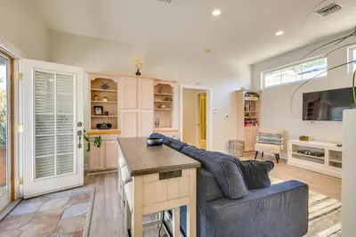 a living room with a couch and a table at Luxe Pasadena Casita with Fireplace and Grill in Pasadena