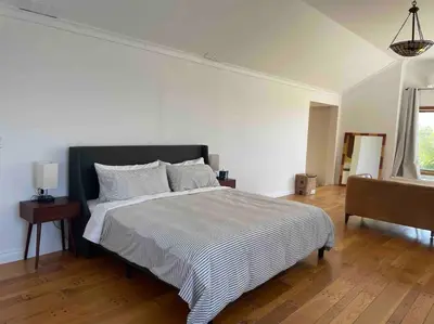 a white bedroom with a large bed and a window at 30 PCT OFF! Malibu Romantic Suite, Ocean View, Beach in Malibu