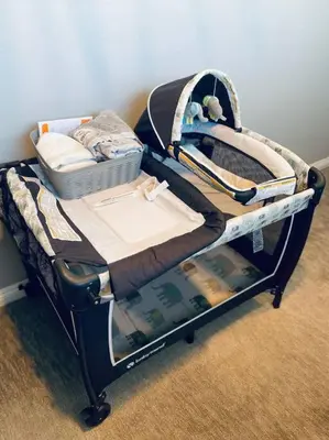 a bunk bed with a baby crib in a room at Private Heated Pool Oasis/Disney/Retro Arcade/Gym in Placentia