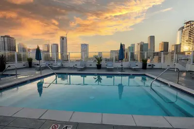 a swimming pool on the roof of a building at Downtown LA's Most Requested Property, Sleeps 4 with Free Parking! in Los Angeles