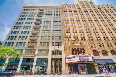 a large building on the corner of a street at Downtown LA's Most Requested Property, Sleeps 4 with Free Parking! in Los Angeles