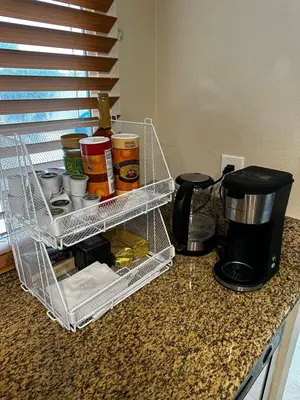 a wire basket sitting on a counter with food at Buxton Private Room and Bath Wheel Chair Access in Rialto