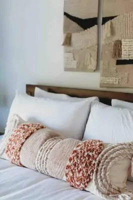 a bed with two pillows on top of it at @wild_olive_den ~ Serene Weekend Getaway Cabin in Running Springs