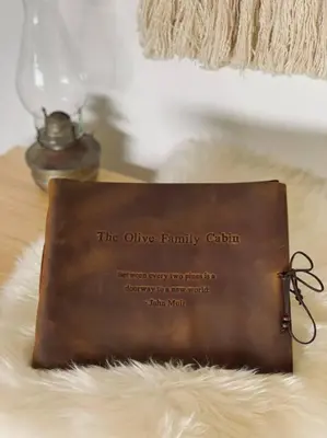 a brown purse sitting on top of aumedumedumed at @wild_olive_den ~ Serene Weekend Getaway Cabin in Running Springs