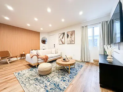 a living room with a couch and a table at Hollywood Habitat - BR11-WH in Los Angeles