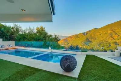 a swimming pool with a view of a mountain at Troy Hill in Los Angeles