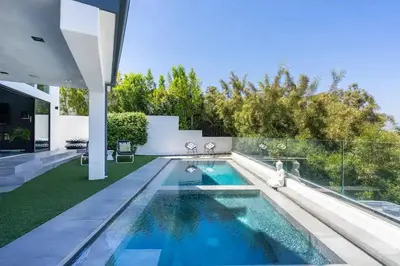 a swimming pool in the backyard of a house at Troy Hill in Los Angeles