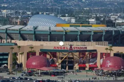 a baseball stadium with red domes in front of it at Lovely & coxy 2BR/2BA! 5MIN to Disney! in Anaheim