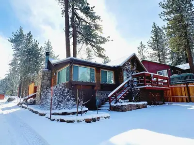 a cabin in the woods in the snow at Boulder Pines - Walk to lake and Boulder Bay park at those cozy location! in Big Bear Lake