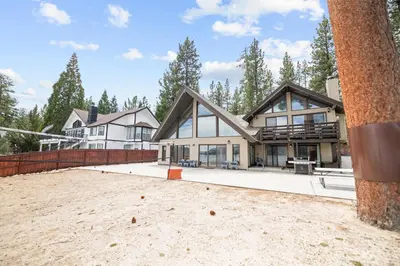 an exterior view of a house at Hakuna Matata Lakefront - LAKEFRONT, PRIVATE DOCK, AND GAME ROOM! in Big Bear Lake