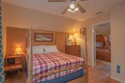 a bedroom with a bed and a ceiling fan at Sweet Retreat - Spectacular little hideaway, cozy family getaway near the lake! in Big Bear Lake