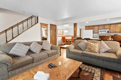 a living room with two couches and a table at Summit X-ross Roads - Just a short drive to the Village and the lake with forest views! in Big Bear Lake