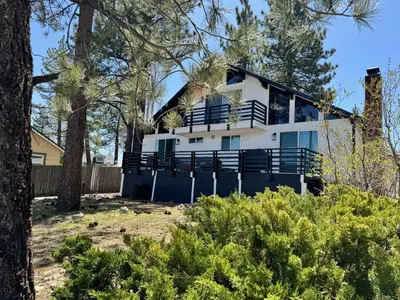 a house in the woods with trees at Big Bear Lake View - By far the best location Big Bear, walk to Lake! in Big Bear Lake