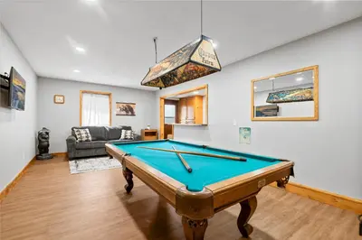 a living room with a pool table at Hidden Spot - Desirable Fox Farm area of Big Bear in Big Bear Lake