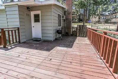 a wooden deck outside of a house at Honey Bear - Close to lake and village in Big Bear Lake