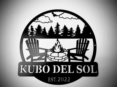 a logo with two chairs and a camp fire at Kubo Del Sol - DREAM LOCATION WITH HOT TUB! Beautiful, light and bright log cabin! in Big Bear Lake