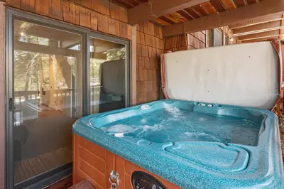 a jacuzzi tub in the back of a house at Snow Summit Thrush8 - Walk to Snow Summit Ski Resort in Big Bear Lake