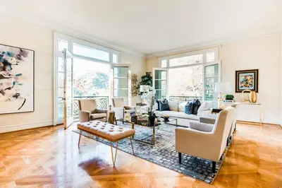 a living room with a couch and a table at Le Jardin in Los Angeles
