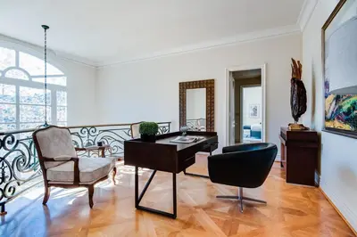 a living room with a desk and a chair at Le Jardin in Los Angeles