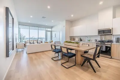 a kitchen and living room with a table and chairs at #Marbella Lane - Panoramic Delight Dream Escape! in Long Beach