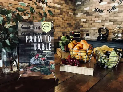 a farm to table with baskets of fruits and vegetables at Doubletree By Hilton Pomona in Pomona