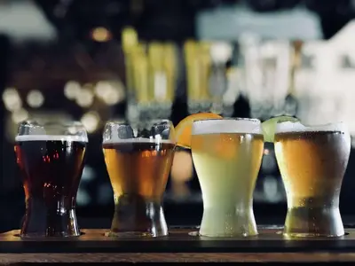 four different types of beer glasses on a bar at Doubletree By Hilton Pomona in Pomona