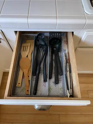 a drawer filled with utensils in a kitchen at Charming Bright Traditional Home in Sherman Oaks in Sherman Oaks