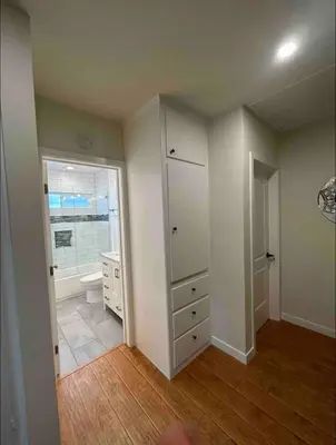 an empty bathroom with a toilet and a window at Villa La Verde - Newly Designed 4BR Villa with Pool & Guesthouse by Topanga in Los Angeles