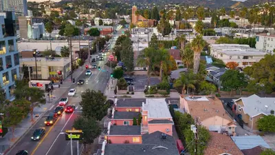 an aerial view of a city with cars on a street at Southwest by AvantStay in Los Angeles
