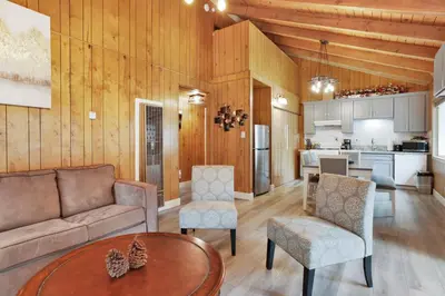 a living room with a couch and chairs and a table at Sweet Retreat 1- Cozy Relaxing Resort Cabin in Big Bear Lake