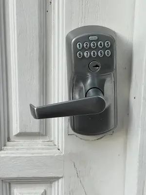a doorhandle with a phone on a door at Large Luxury Studio with View in Santa Monica in Santa Monica