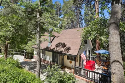 an aerial view of a house in the woods at Twin Peaks Vacation Rental with Hot Tub! in Twin Peaks