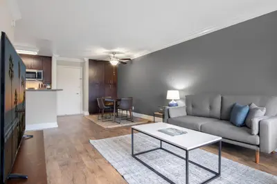 a living room with a couch and a table at Westside 1BR w Pool Gym Bball Tennis Courts LAX-85 in Los Angeles
