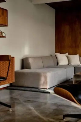 a living room with a couch in the corner at Eichler Mid Century Modern Designer Pool/Jacuzzi in Thousand Oaks
