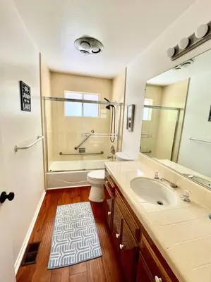 a bathroom with a sink and a shower and a toilet at Family Friendly A Frame, Pets stay Free! in Lake Arrowhead