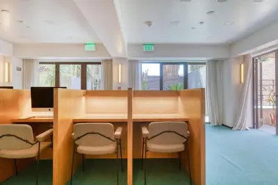 a conference room with a wooden table and chairs at Hollywood studio w pool concierge nr shops LAX-1088 in Los Angeles