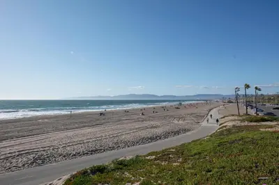 a beach with a bunch of people on it at Playa del Rey 1BR w Gym WD Pool nr LAX Beach LAX-147 in Los Angeles