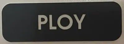 a sign with the word play on it at Ploy in Monterey Park