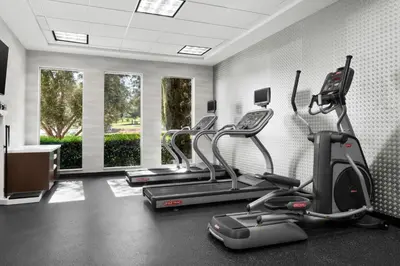 a gym with treadmills and elliptical machines at Fairfield Inn & Suites Riverside Corona/Norco in Norco