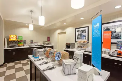 a large room with a counter in a store at Hampton Inn Los Angeles Int'l Airport/Hawthorne in Los Angeles