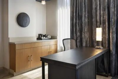 an office with a desk and a chair and a window at Courtyard by Marriott Los Angeles L.A. LIVE in Los Angeles