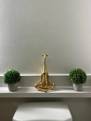 a shelf with two plants and a miniature tower on it at Arion- Cozy Santa Monica getaway steps to the beach Free Parking in Los Angeles