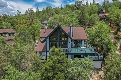 an aerial view of a house in the woods at Jackalope Lodge in Lake Arrowhead