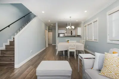 a living room with a couch and a table at Comfy 4BR home near Korea Town in Los Angeles