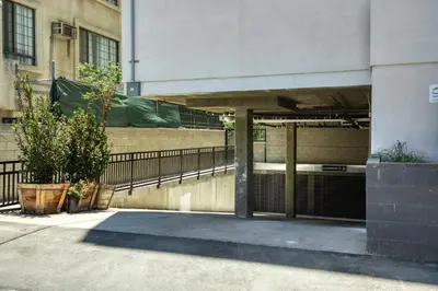 an outside view of a building with a fence at Culver City 1br w rooftop lounge access to 405 LAX-1124 in Los Angeles