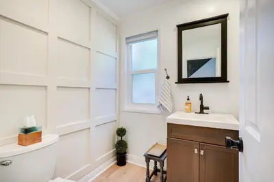 a bathroom with a sink and a mirror at Chic Santa Paula Home with Mountain and City Views! in Santa Paula