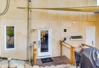 a building with a door on the side of it at The Creek Retreat - Totally private 1Br/1Bd in Newbury Park