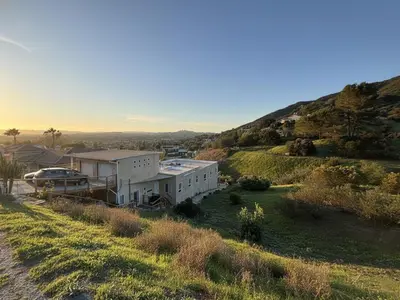 an aerial view of a house on a hill at The Creek Retreat - Totally private 1Br/1Bd in Newbury Park