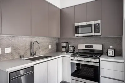 a kitchen with a stove and a microwave at Culver City 1br w pool gym easy access to 405 LAX-1136 in Los Angeles